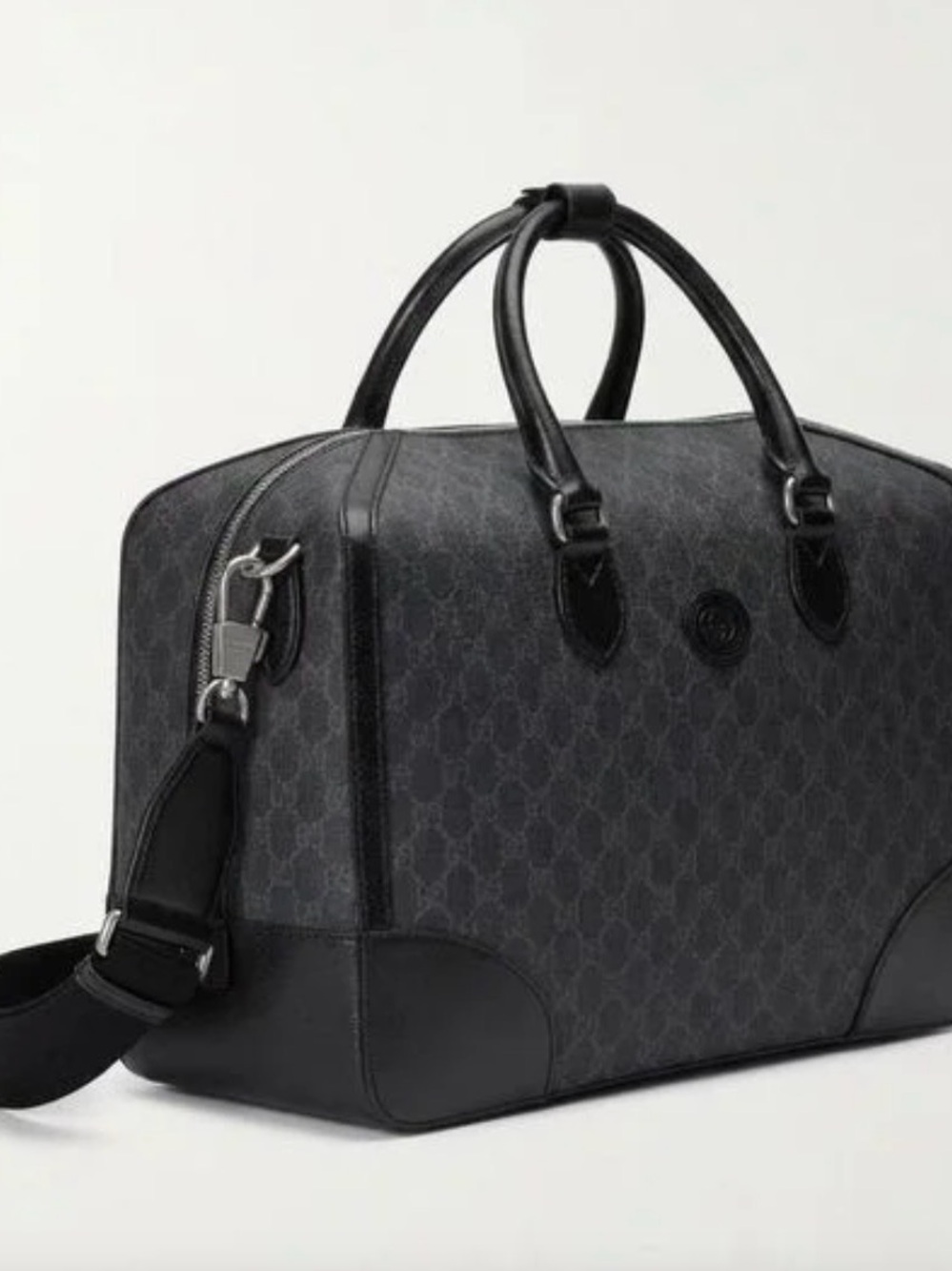 Brand new Authentic Gucci Gray Monogram and Black Leather Duffel Bag.